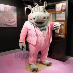 Pink Rhinoceros mascot costume character dressed with a Chinos and Pocket squares