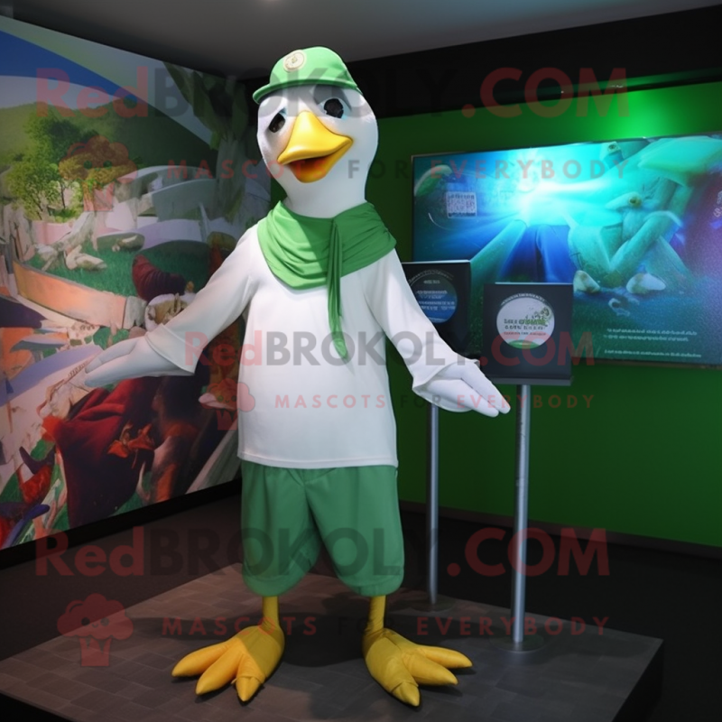 Green Seagull mascot costume character dressed with a T-Shirt and Caps Green Seagull mascot costume character dressed with a T-Shirt and Caps