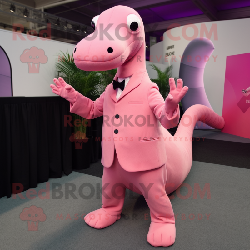 Pink Diplodocus mascot costume character dressed with a Suit Jacket and Lapel pins