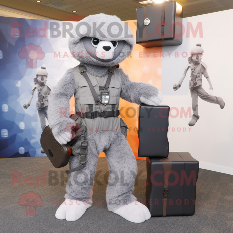 Gray Sniper mascot costume character dressed with a Jumpsuit and Briefcases Gray Sniper mascot costume character dressed with a Jumpsuit and Briefcases
