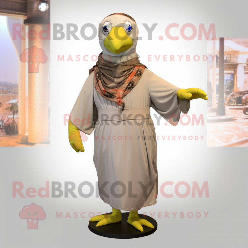 Olive Gull mascot costume character dressed with a Jumpsuit and Scarf clips Olive Gull mascot costume character dressed with a Jumpsuit and Scarf clips