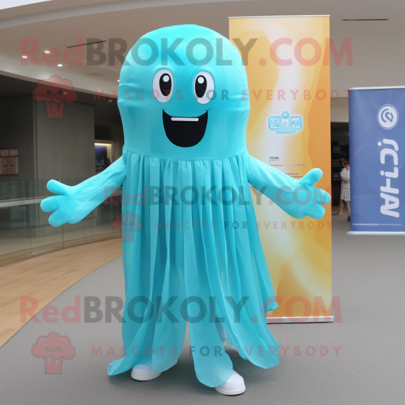 Cyan Jellyfish mascot costume character dressed with a Chinos and Scarves Cyan Jellyfish mascot costume character dressed with a Chinos and Scarves
