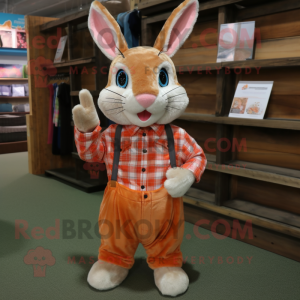 Peach Wild Rabbit mascot costume character dressed with a Flannel Shirt and Rings