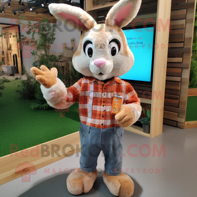 Peach Wild Rabbit mascot costume character dressed with a Flannel Shirt and Rings Peach Wild Rabbit mascot costume character dressed with a Flannel Shirt and Rings