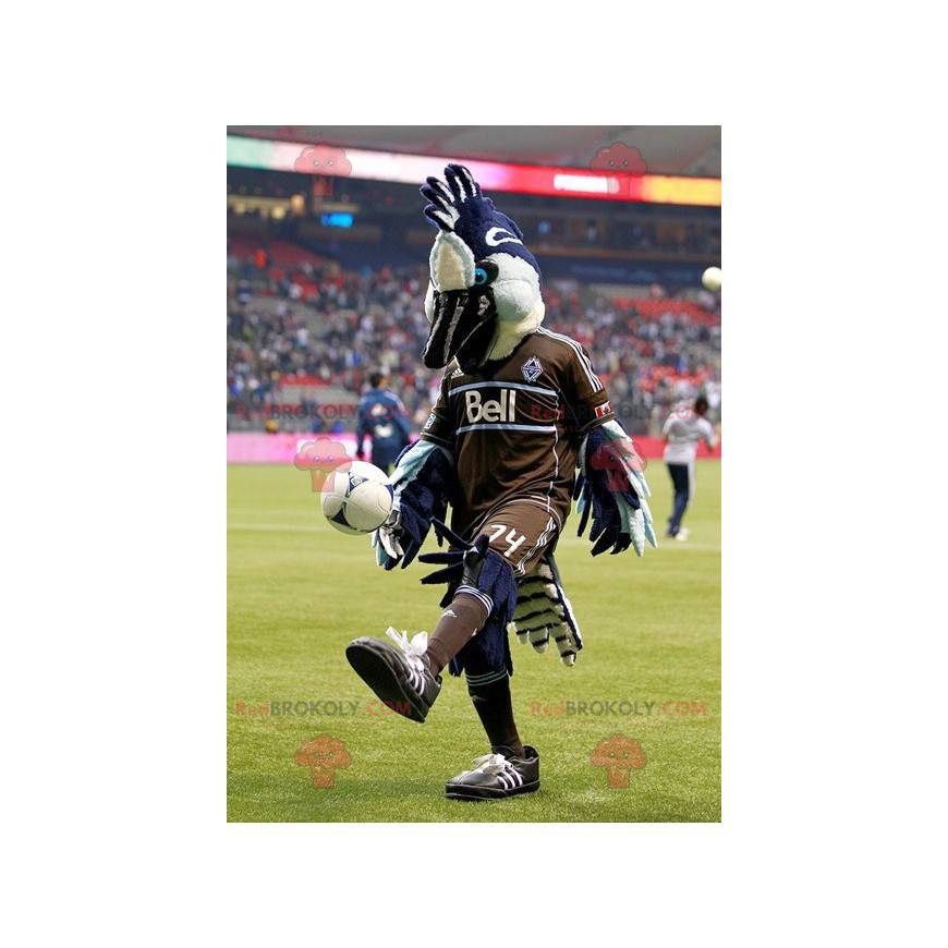 Blue white and black bird mascot in brown outfit - Blue white and black bird mascot in brown outfit -