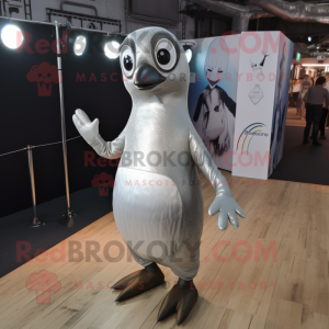 Silver Penguin mascot costume character dressed with a Playsuit and Earrings