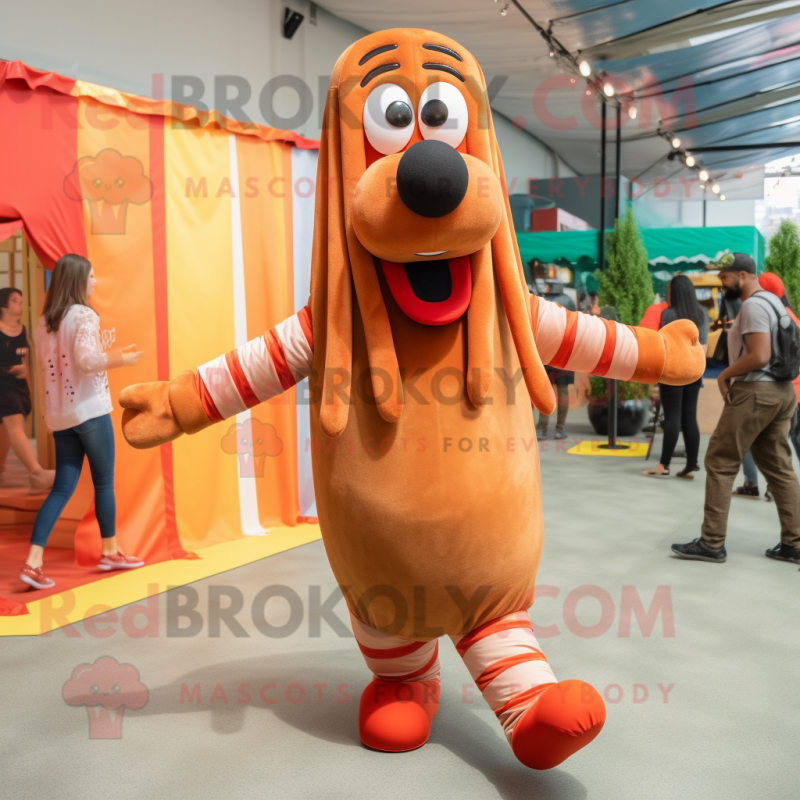 Rust Hot Dogs mascot costume character dressed with a Romper and Wraps Rust Hot Dogs mascot costume character dressed with a Romper and Wraps