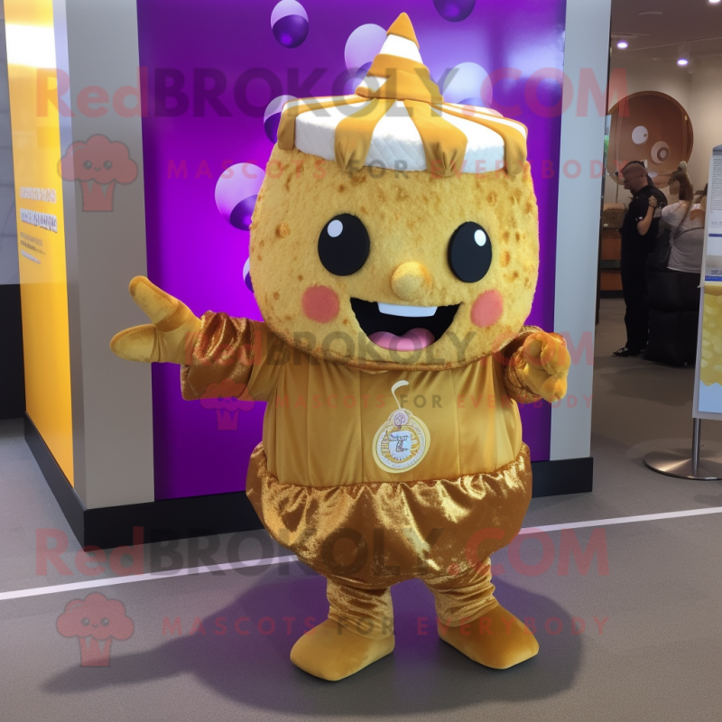 Gold Cupcake mascot costume character dressed with a Vest and Keychains Gold Cupcake mascot costume character dressed with a Vest and Keychains