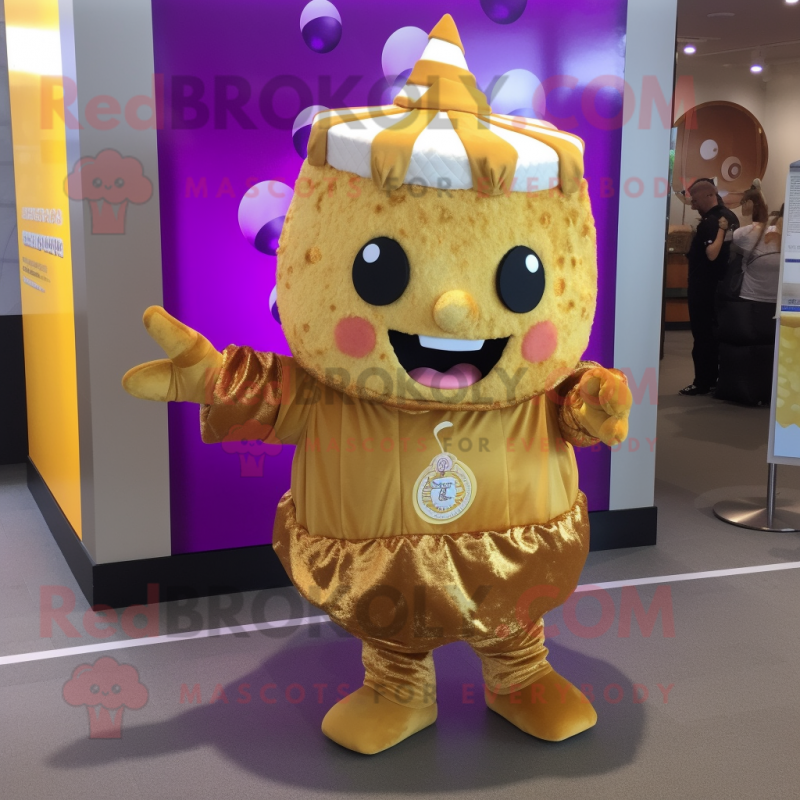 Gold Cupcake mascot costume character dressed with a Vest and Keychains