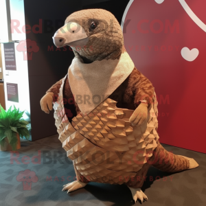 Brown Pangolin mascot costume character dressed with a Shift Dress and Shawl pins