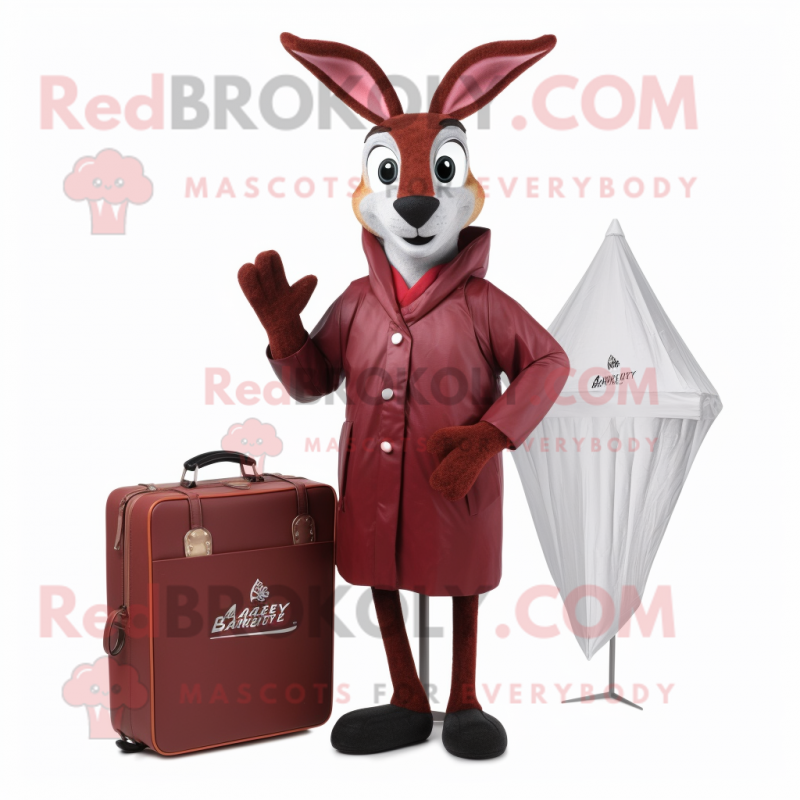 Maroon Gazelle mascot costume character dressed with a Raincoat and Briefcases