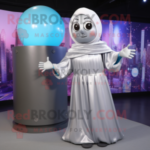 Silver Human Cannon Ball mascot costume character dressed with a Shift Dress and Shawls