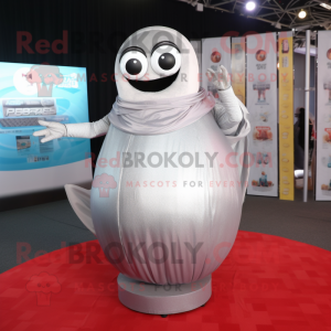 Silver Human Cannon Ball mascot costume character dressed with a Shift Dress and Shawls