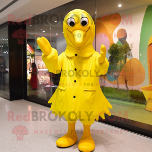 Lemon Yellow Turkey mascot costume character dressed with a Raincoat and Gloves