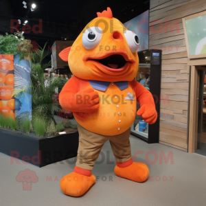 Orange Piranha mascot costume character dressed with a Oxford Shirt and Foot pads