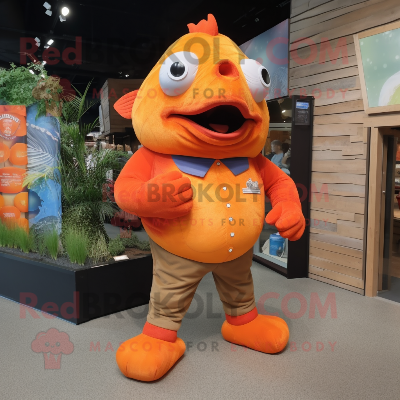 Orange Piranha mascot costume character dressed with a Oxford Shirt and Foot pads Orange Piranha mascot costume character dressed with a Oxford Shirt and Foot pads