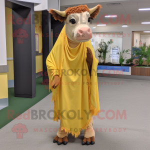 Gold Guernsey Cow mascot costume character dressed with a Maxi Dress and Shawl pins