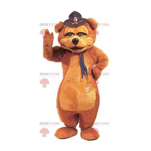 Mascotte d'ours marron avec un chapeau sur la tête -