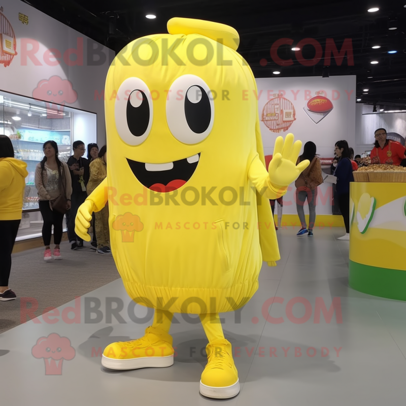 Lemon Yellow Lasagna mascot costume character dressed with a Jumpsuit and Shoe laces Lemon Yellow Lasagna mascot costume character dressed with a Jumpsuit and Shoe laces