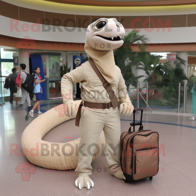 Beige Titanoboa mascot costume character dressed with a Skinny Jeans and Messenger bags