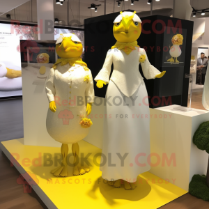 Yellow Quail mascot costume character dressed with a Wedding Dress and Cufflinks