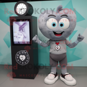 Gray Heart mascot costume character dressed with a T-Shirt and Digital watches