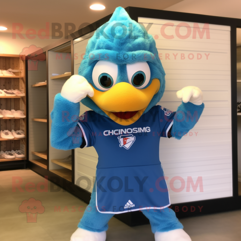 Sky Blue Chicken Parmesan mascot costume character dressed with a Rash Guard and Cummerbunds Sky Blue Chicken Parmesan mascot costume character dressed with a Rash Guard and Cummerbunds