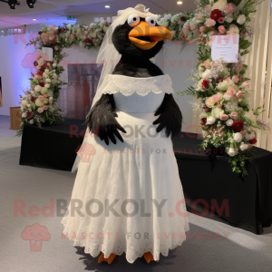 nan Blackbird mascot costume character dressed with a Wedding Dress and Backpacks