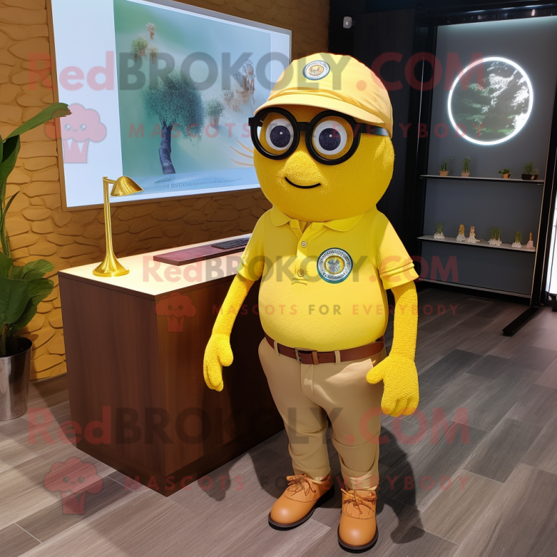 Yellow Raspberry mascot costume character dressed with a Polo Tee and Eyeglasses