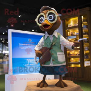 Brown Gosling mascot costume character dressed with a Board Shorts and Reading glasses