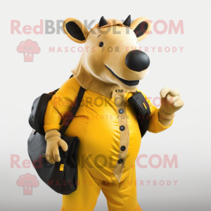 Gold Tapir mascot costume character dressed with a Trousers and Messenger bags