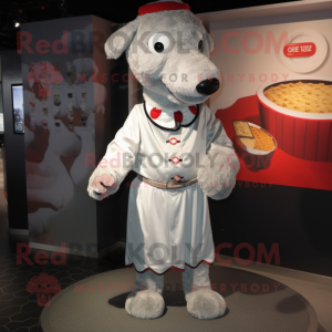Silver Shepard'S Pie mascot costume character dressed with a Culottes and Cufflinks