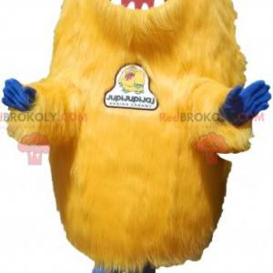 Håraktig gul skapningsmaskott. Grizzly maskot - Redbrokoly.com