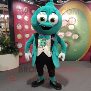 Teal Green Bean mascot costume character dressed with a Waistcoat and Keychains