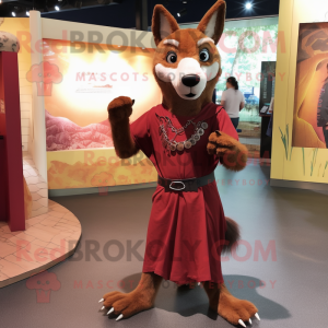 Maroon Dingo mascot costume character dressed with a Empire Waist Dress and Anklets