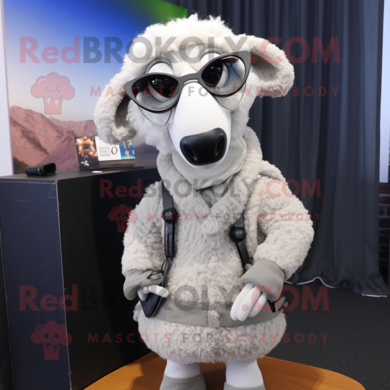 Silver Merino Sheep mascot costume character dressed with a Jacket and Eyeglasses