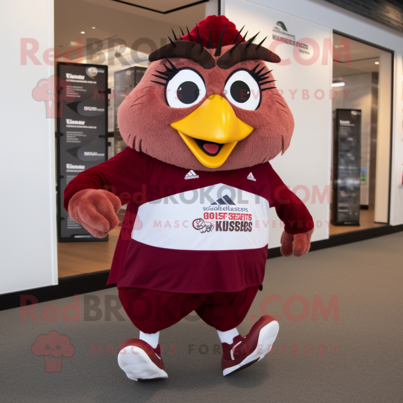 Maroon Quail mascot costume character dressed with a Running Shorts and Headbands