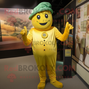 Gold Zucchini mascot costume character dressed with a Jumpsuit and Hat pins