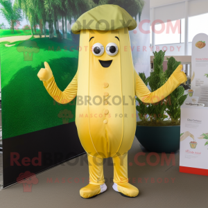 Gold Zucchini mascot costume character dressed with a Jumpsuit and Hat pins