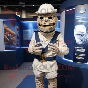 Navy Mummy mascot costume character dressed with a Suit Pants and Brooches