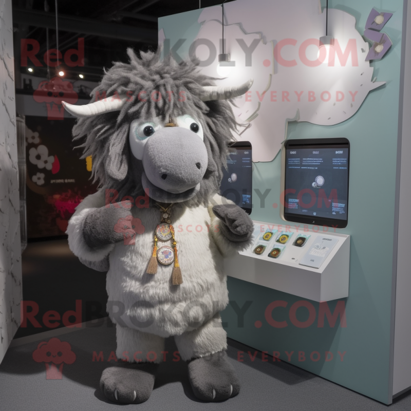 Gray Yak mascot costume character dressed with a Romper and Coin purses Gray Yak mascot costume character dressed with a Romper and Coin purses