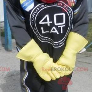 Mascote do motociclista com um terno e um capacete -