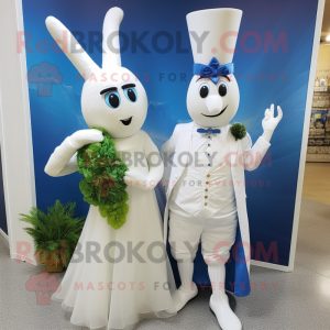 Blue Carrot mascot costume character dressed with a Wedding Dress and Brooches