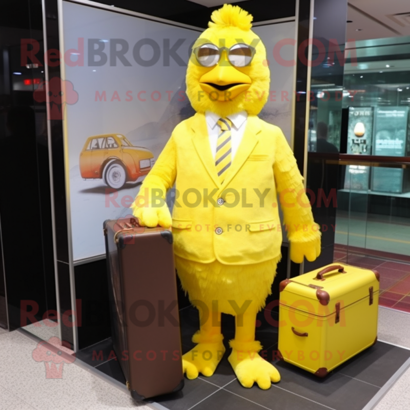 Lemon Yellow Fried Chicken mascot costume character dressed with a Cover-up and Briefcases Lemon Yellow Fried Chicken mascot costume character dressed with a Cover-up and Briefcases