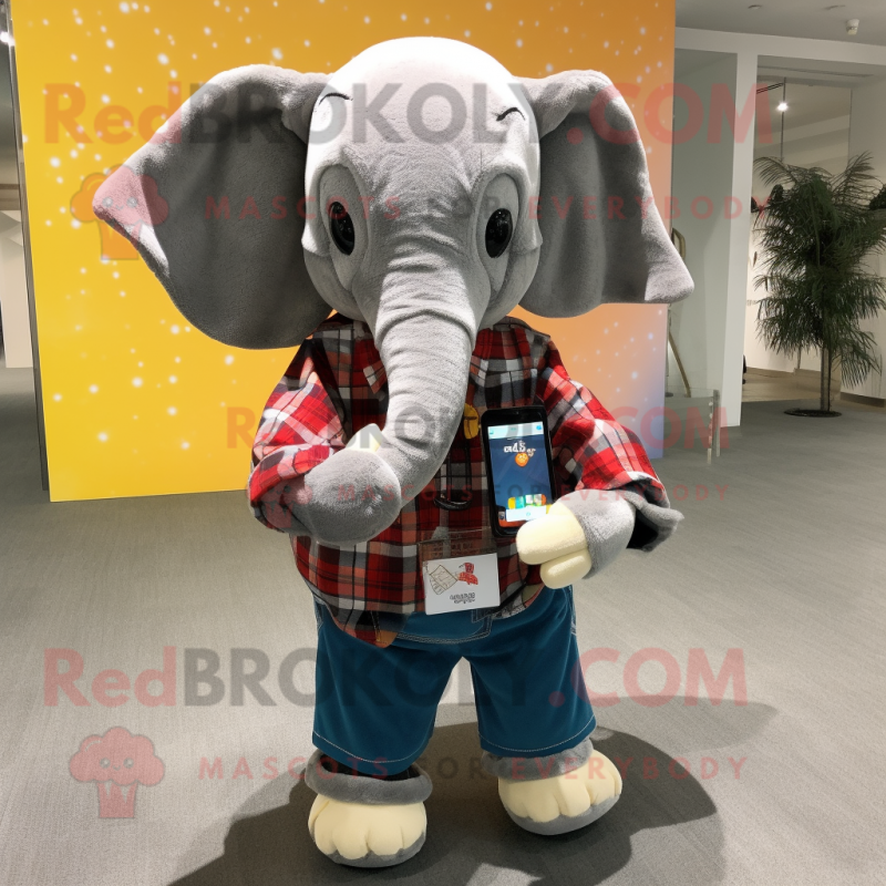 nan Elephant mascot costume character dressed with a Flannel Shirt and Smartwatches nan Elephant mascot costume character dressed with a Flannel Shirt and Smartwatches