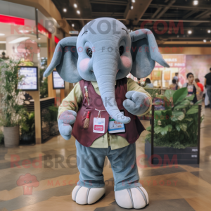 nan Elephant mascot costume character dressed with a Flannel Shirt and Smartwatches