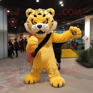 Yellow Saber-Toothed Tiger mascot costume character dressed with a Jumpsuit and Clutch bags
