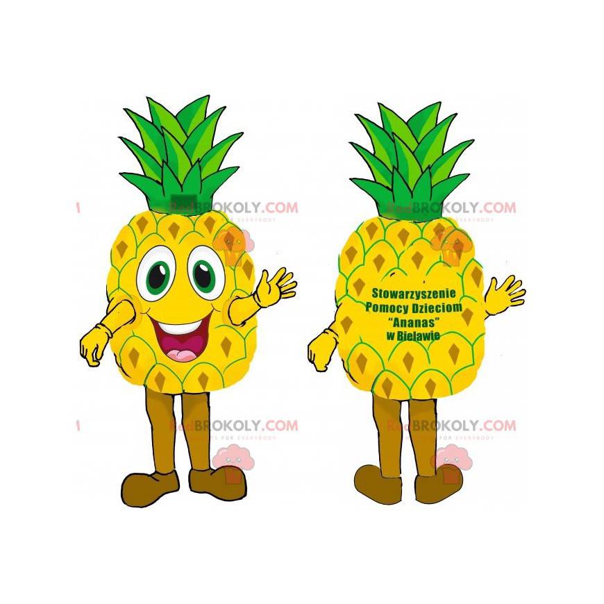 Mascotte d'ananas jaune et vert géant très souriant. -