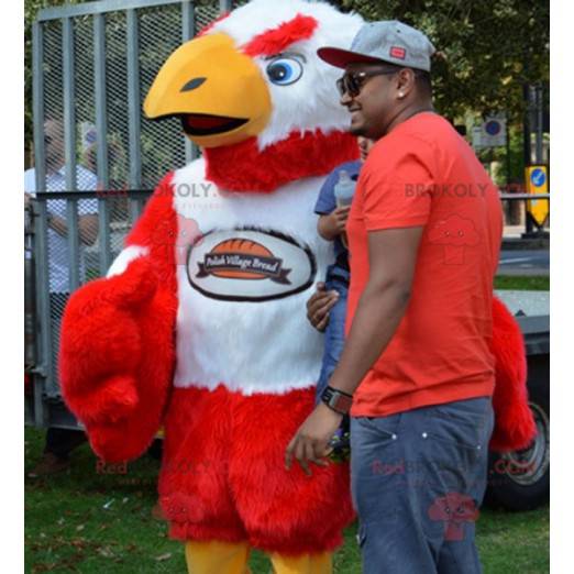 Mascotte avvoltoio gigante e peloso rosso e bianco -