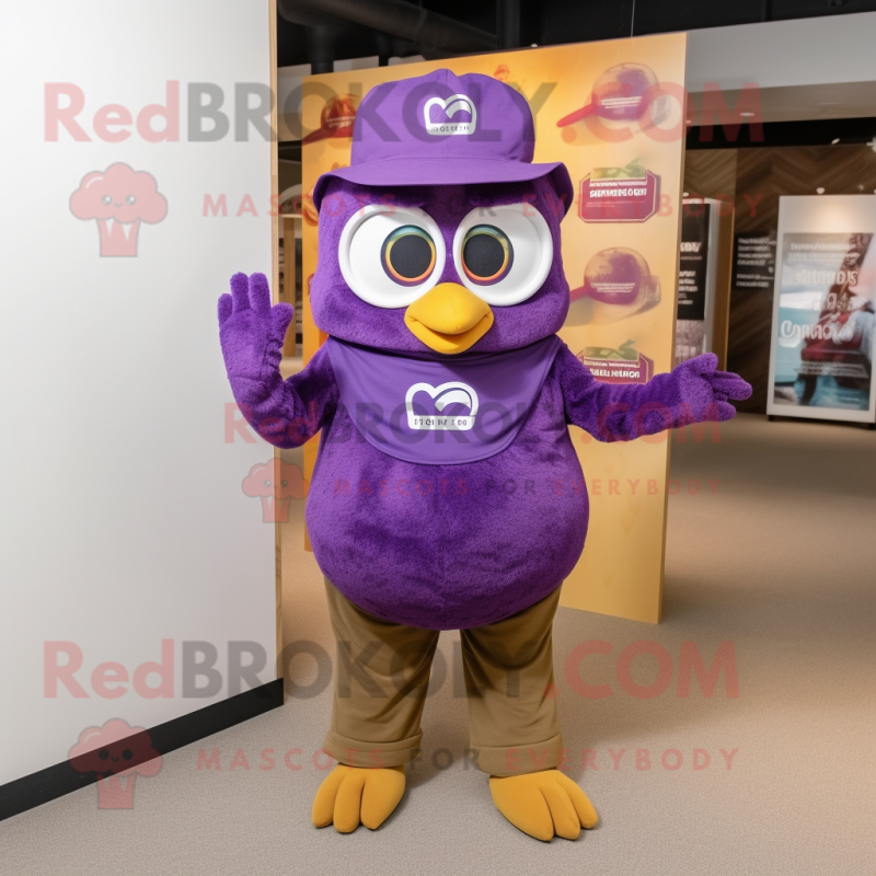 Purple Owl mascot costume character dressed with a Polo Shirt and Hats Purple Owl mascot costume character dressed with a Polo Shirt and Hats